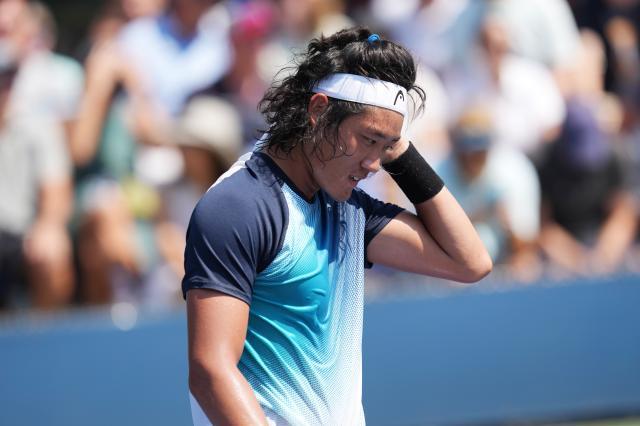 开云体育注册入口-张之臻丢赛点五盘告负 大满贯首胜这么近那么远？